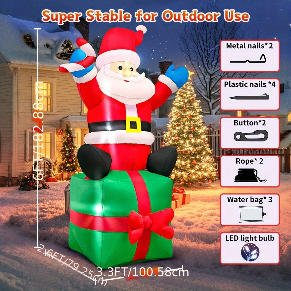 KOOY 6FT Christmas Inflatables Santa Claus Sitting On Gift Box, Christmas Blow Up Yard Decoration, LED Lights For Christmas Party Holiday Xmas, Outdoor Lawn Décor Christmas Decoration